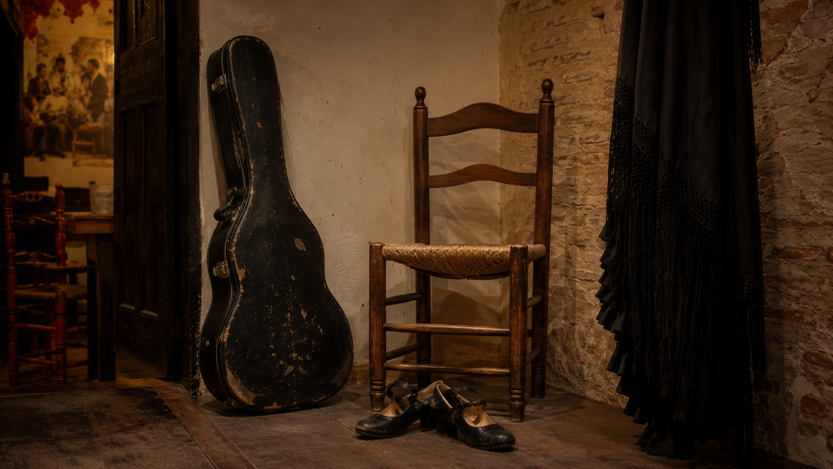 Worn flamenco shoes and guitar case backstage showing a more authentic atmosphere.
