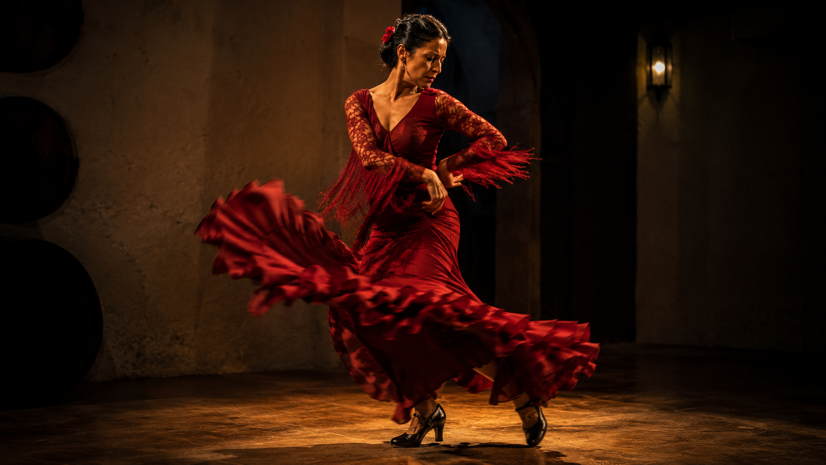 Flamenco dancer performing baile with expressive movement and rhythm.
