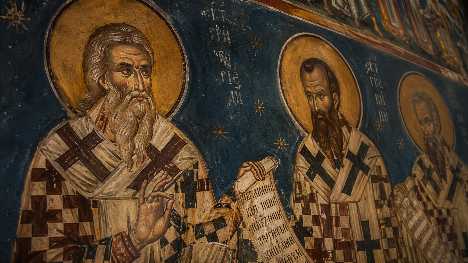 Close-up of Romanian Byzantine-style fresco painting with expressive faces and sacred symbolism.