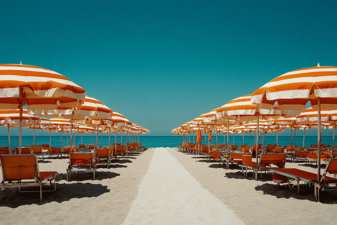 Rows of colorful umbrellas at an Italian beach club (stabilimento), illustrating Italian beach culture.