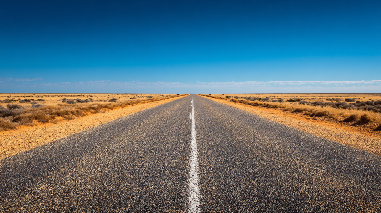 Long straight road crossing the wide Nullarbor Plain.