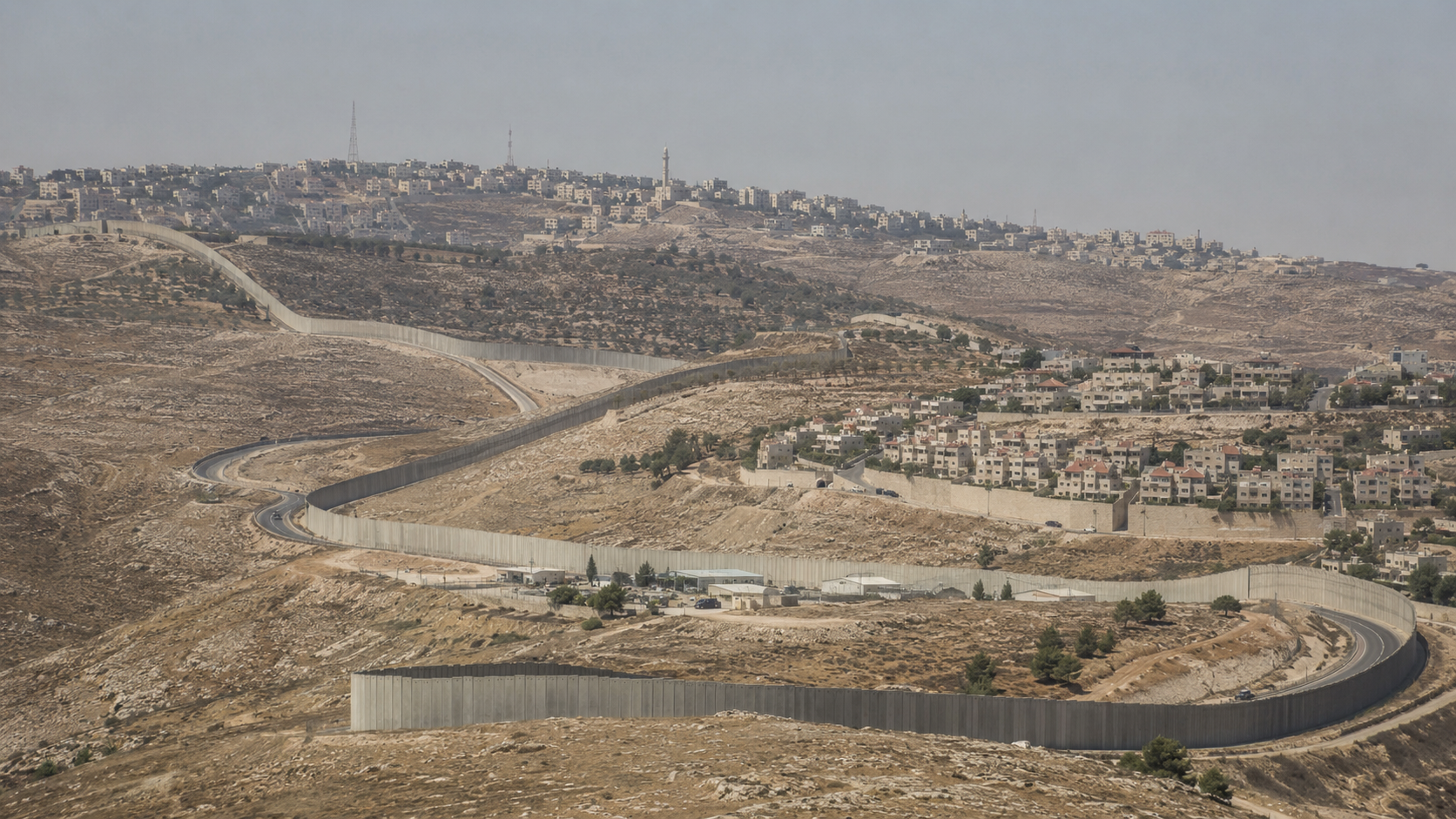 West Bank hillside neighborhoods and roads symbolizing land, security, and settlements