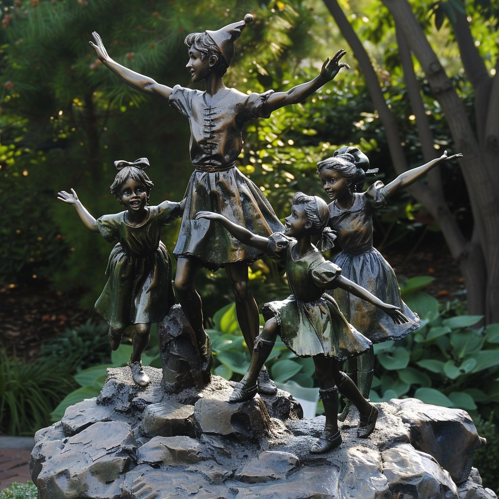 Statues of Peter Pan and scenes from Alice in Wonderland.