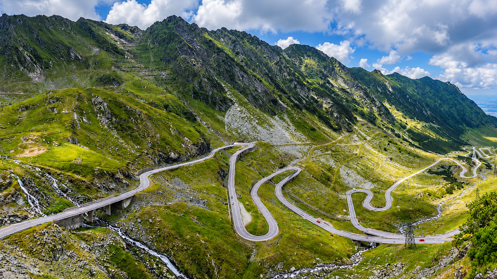 Mountain bends on the Transfăgărășan, an optional seasonal road trip route